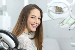 woman prepares for endodontic treatment services