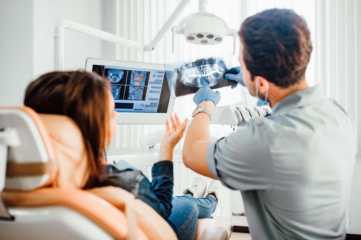 Is an Apicoectomy Worth It_ endodontist shows apicoectomy pros and cons to patient