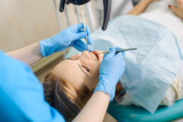 What are the latest root canal techniques woman receives the latest root canal techniques