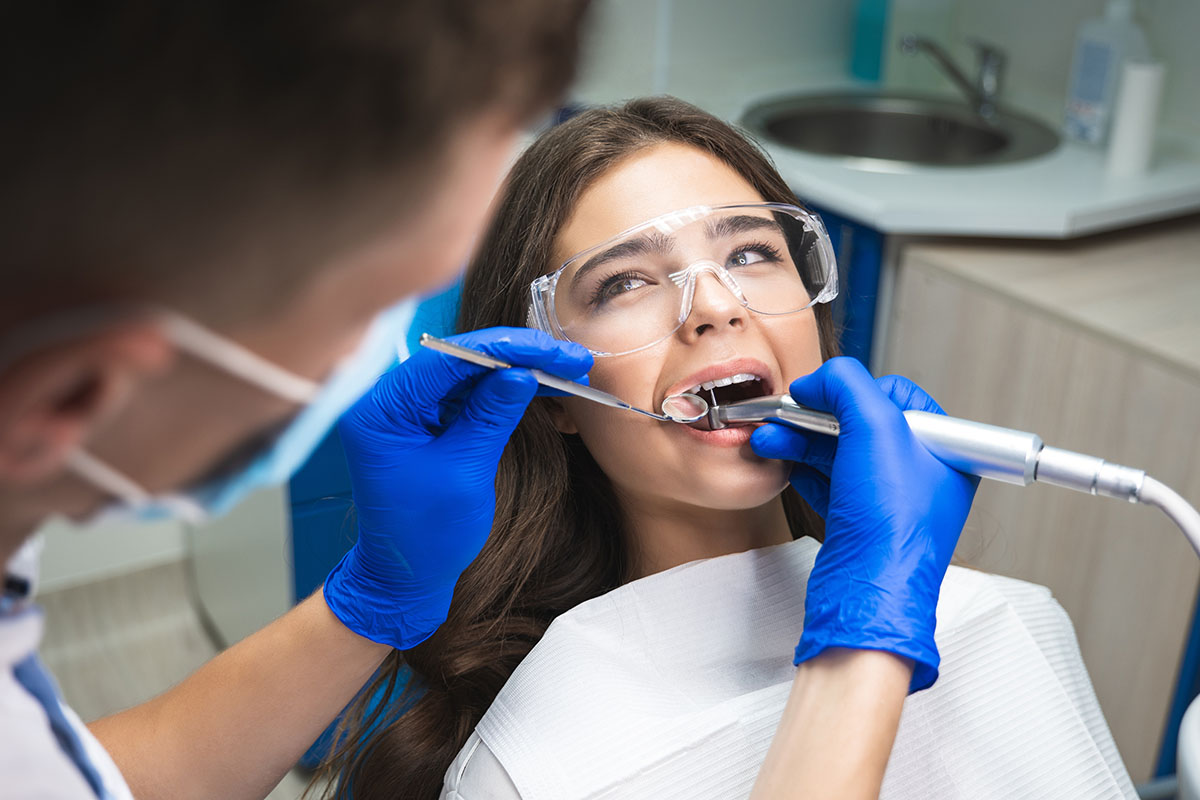 What Are 5 Facts & Myths of Root Canals Person in surgery trying not to think of root canal myths