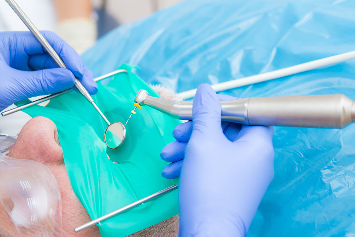 dentist works on patient receiving dental trauma treatment in Ellicott City MD